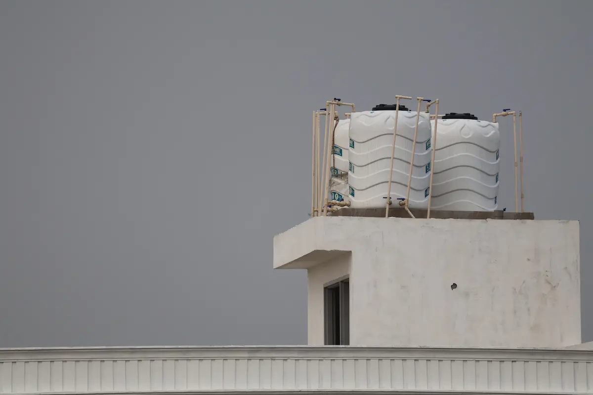 Rooftop water storage tanks installed on a residential building in Dubai