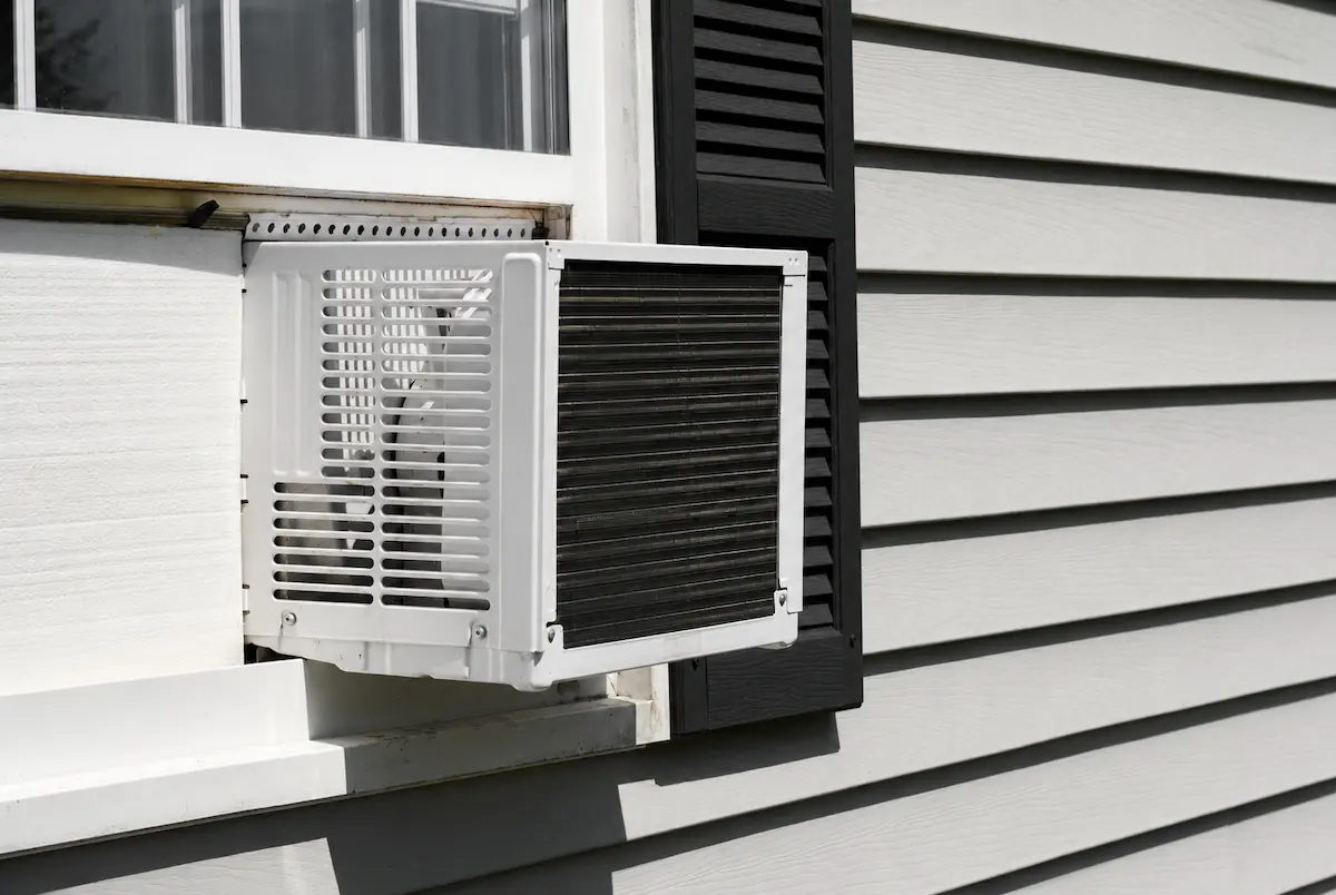 Window AC Unit Installed on Wall – Fast Emergency AC Repair Service